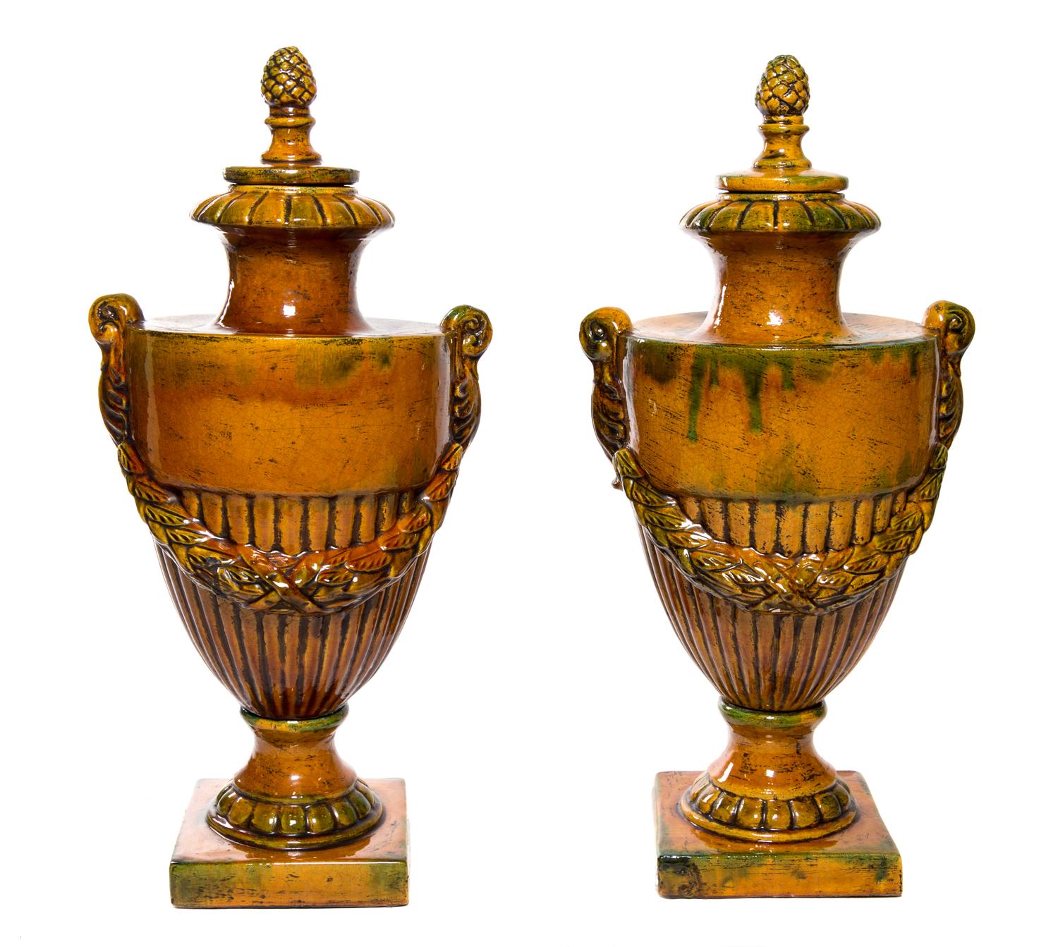 A Pair of Glazed Terra Cotta Urns Height 28 inches. — 20TH CENTURY