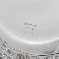 A Group of Four American Silver Repoussé-Decorated Trinket Dishes