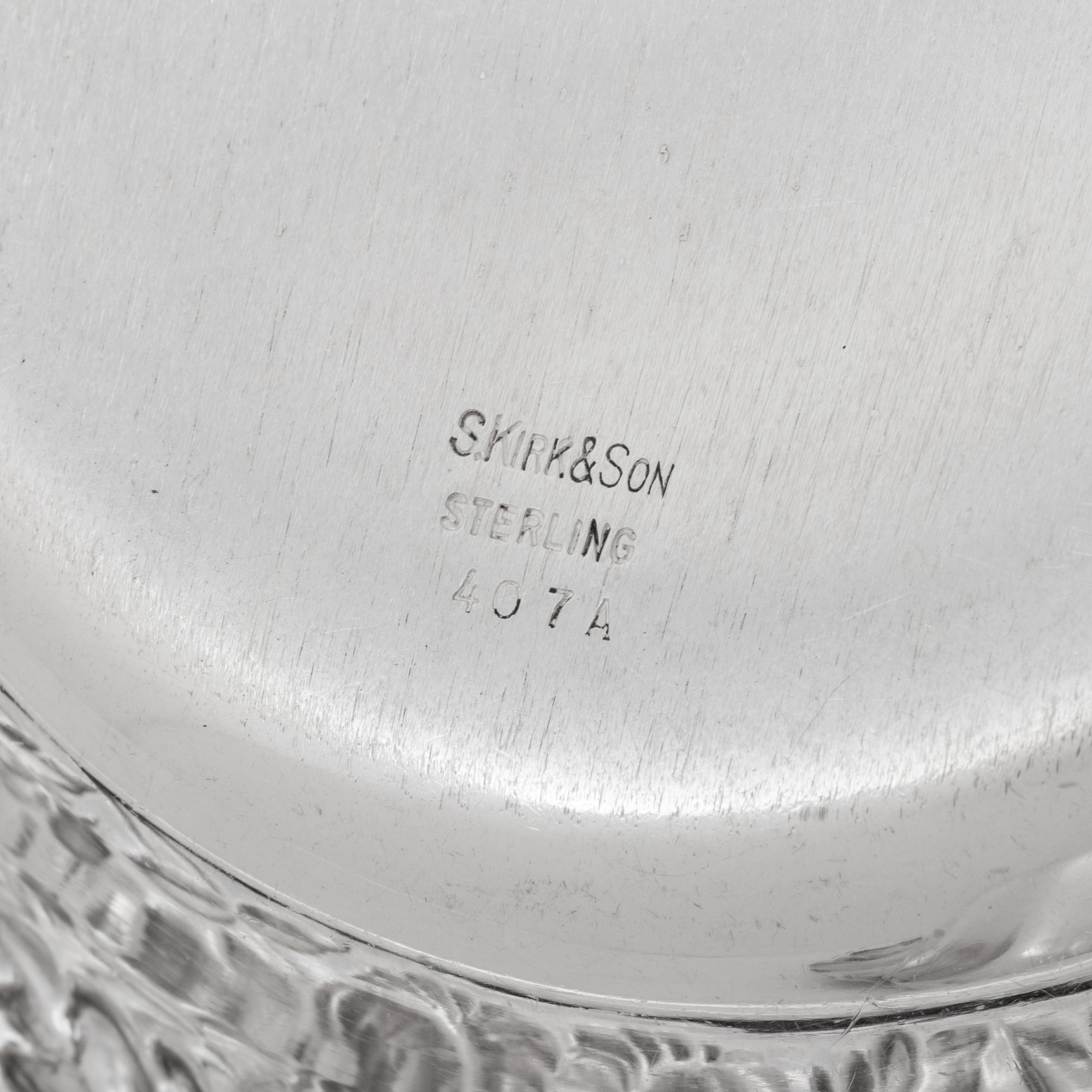 A Group of Four American Silver Repoussé-Decorated Trinket Dishes