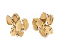 A Pair of Yellow Gold and Diamond Earclips,