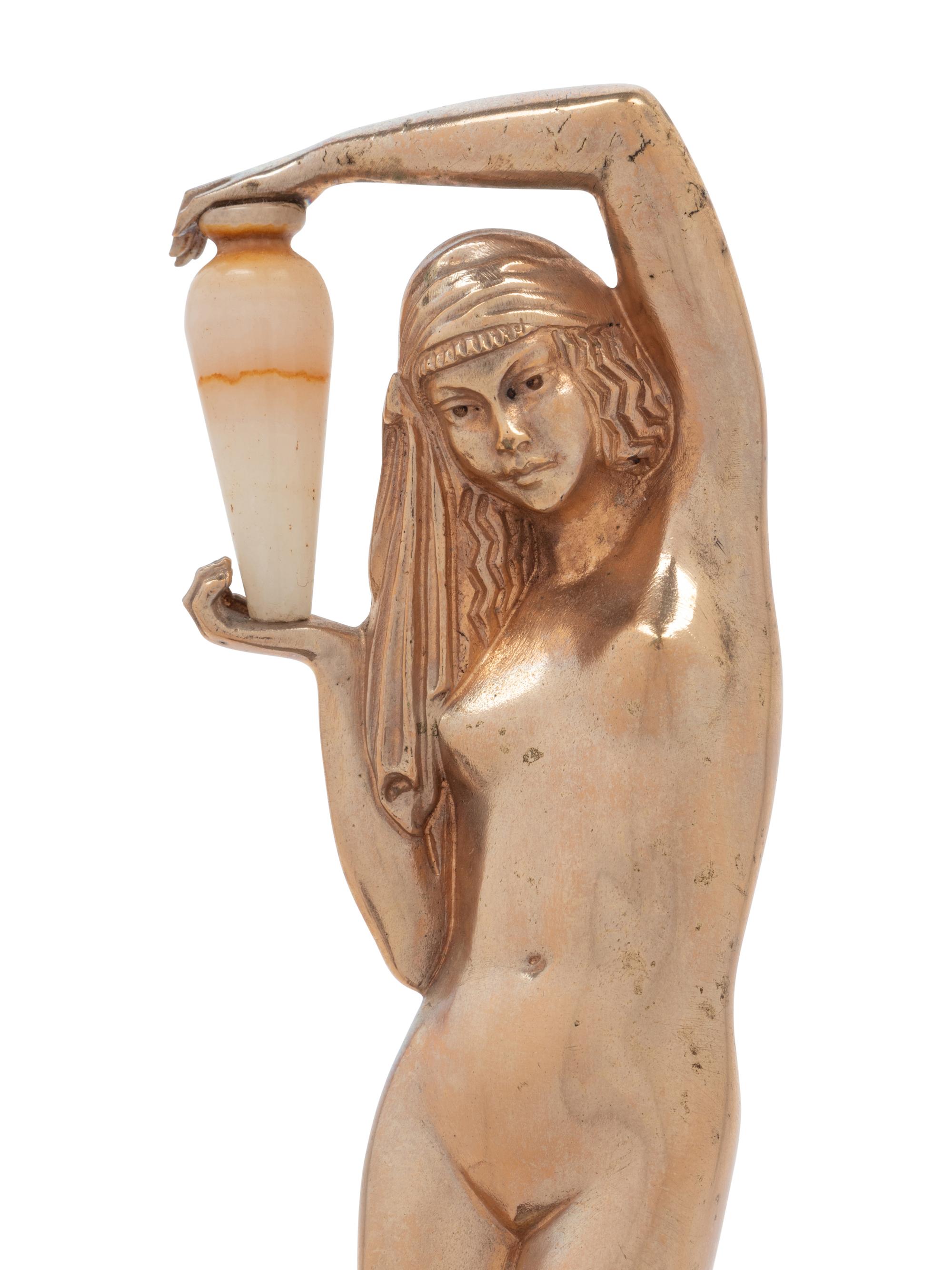 A Continental Onyx and Gilt Metal Figural Lamp