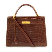 An Hermès Brown Niloticus Crocodile Sellier 32cm Kelly Handbag, 12.5" x 5" x 9.5"; Handle drop: 3.25".