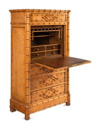 A Victorian Faux Bamboo-Carved Birdseye Maple Bureau Chest