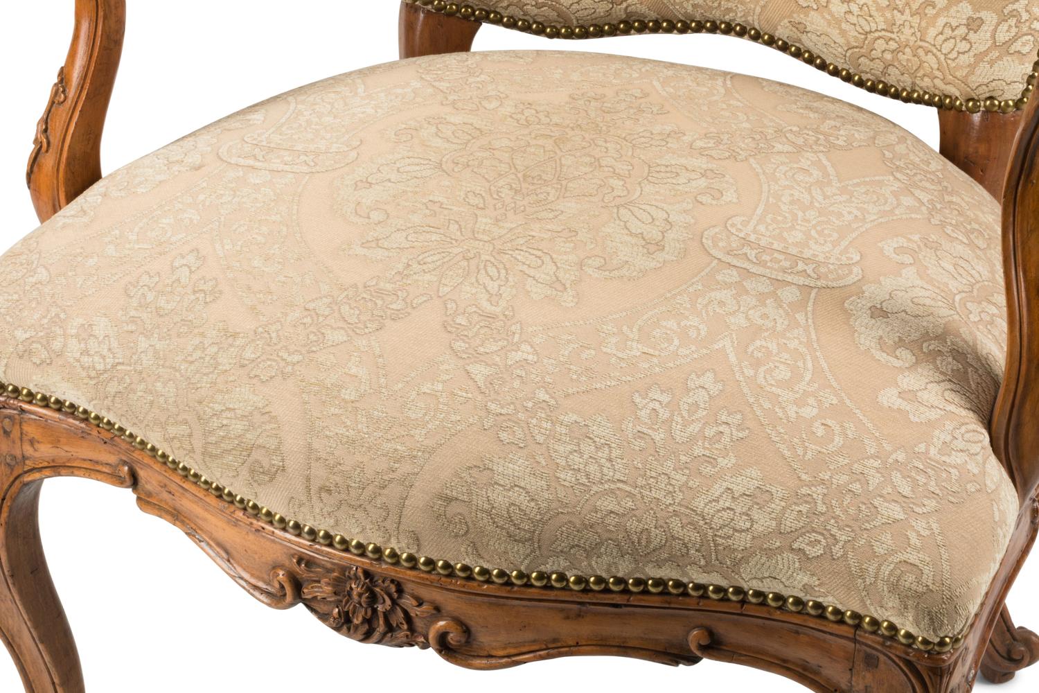 An Italian Carved Walnut Armchair