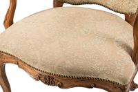 An Italian Carved Walnut Armchair