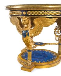 An Empire Style Gilt Bronze and Lapis Lazuli Veneered Guéridon