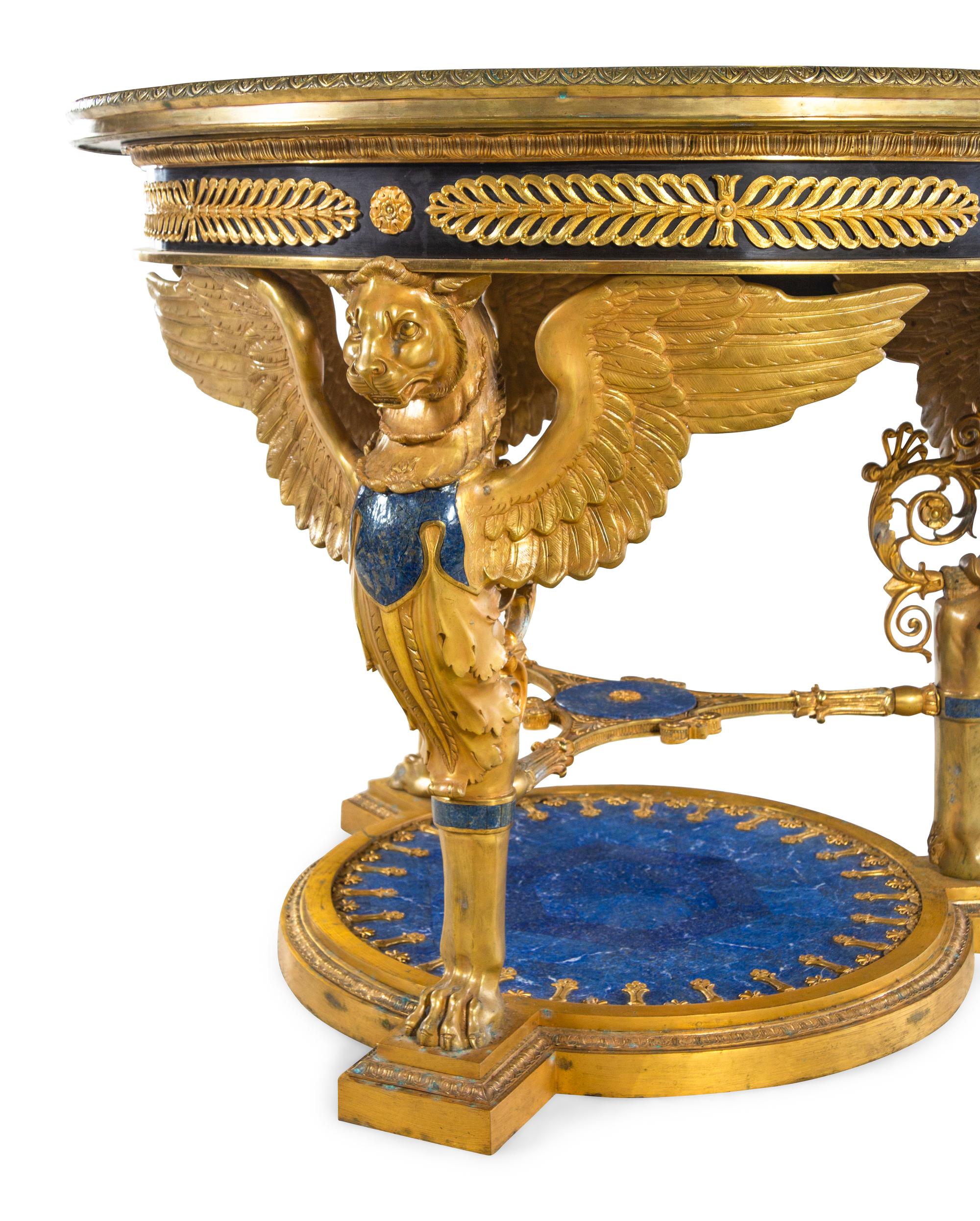 An Empire Style Gilt Bronze and Lapis Lazuli Veneered Guéridon