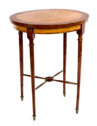 A Burr and Elm-Veneered Walnut Occasional Table Height 29 1/2 x diameter 24 inches. — 20TH CENTURY