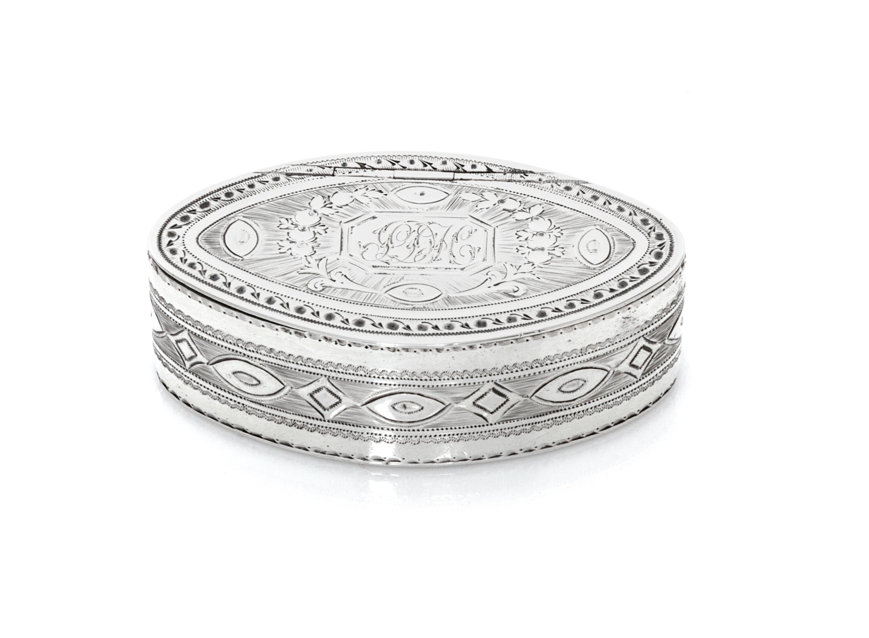 A George IV Snuff Box, James White, London, 1830, of oval form, the hinged lid centered by a rectangular monogrammed cartouche surround