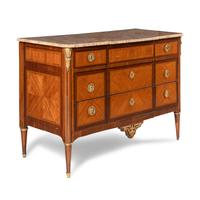 A Louis XVI Gilt Bronze Mounted Tulipwood, Marquetry and Marble-Top Commode