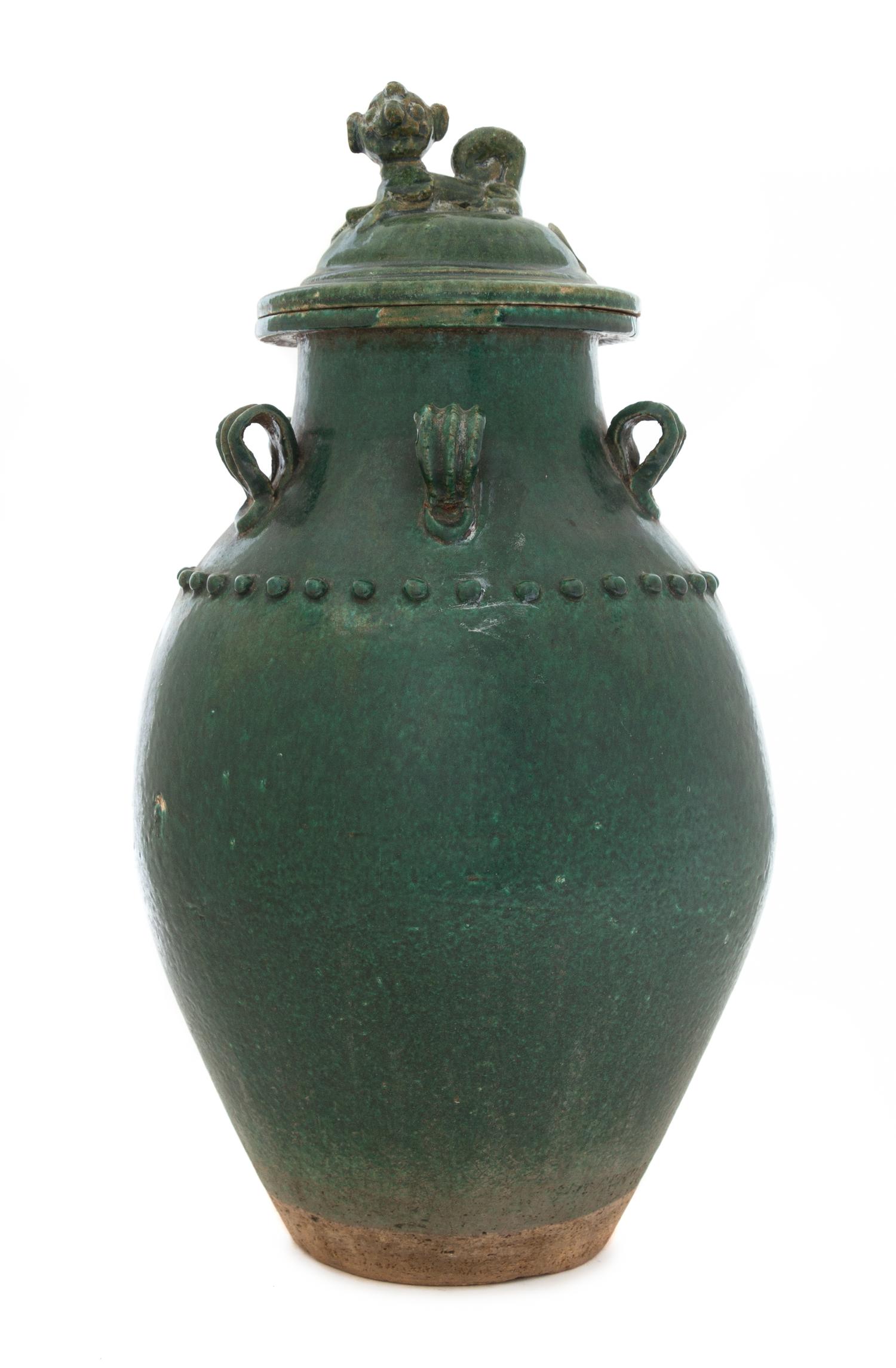 A Green Glazed Earthenware Covered Jar Height 18 1/2 inches. — MING DYNASTY