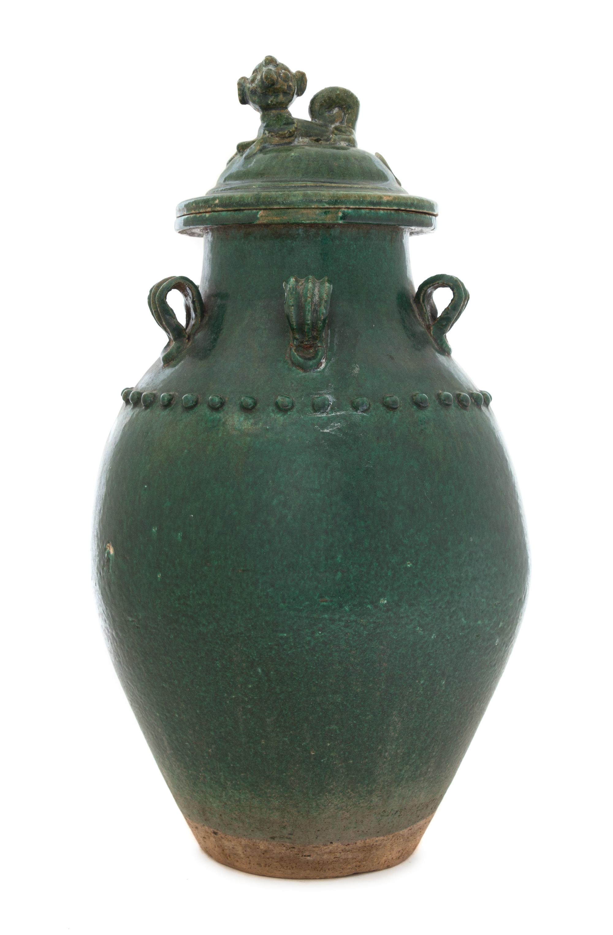 A Green Glazed Earthenware Covered Jar Height 18 1/2 inches. — MING DYNASTY