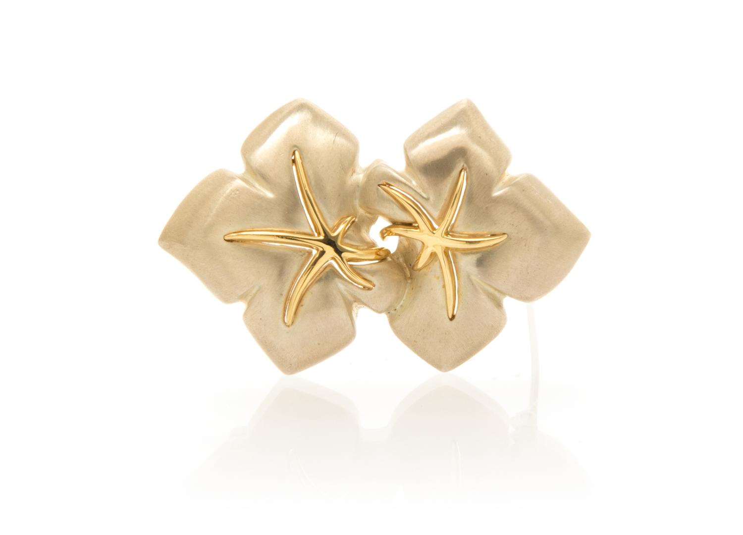 A Sterling Silver and 18 Karat Yellow Gold Brooch, Tiffany & Co., Circa 1991, 11.10 dwts.