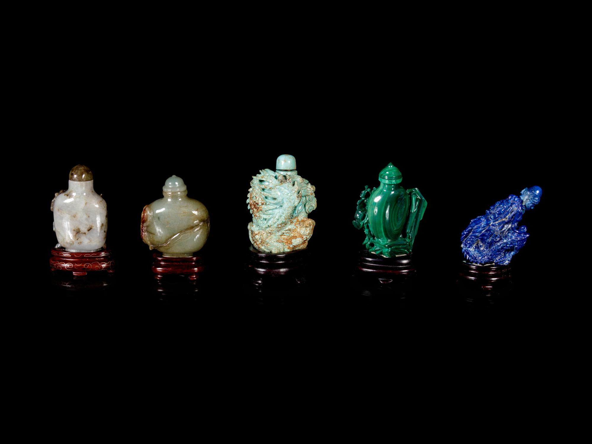 Nine Chinese Carved Hardstone Snuff Bottles