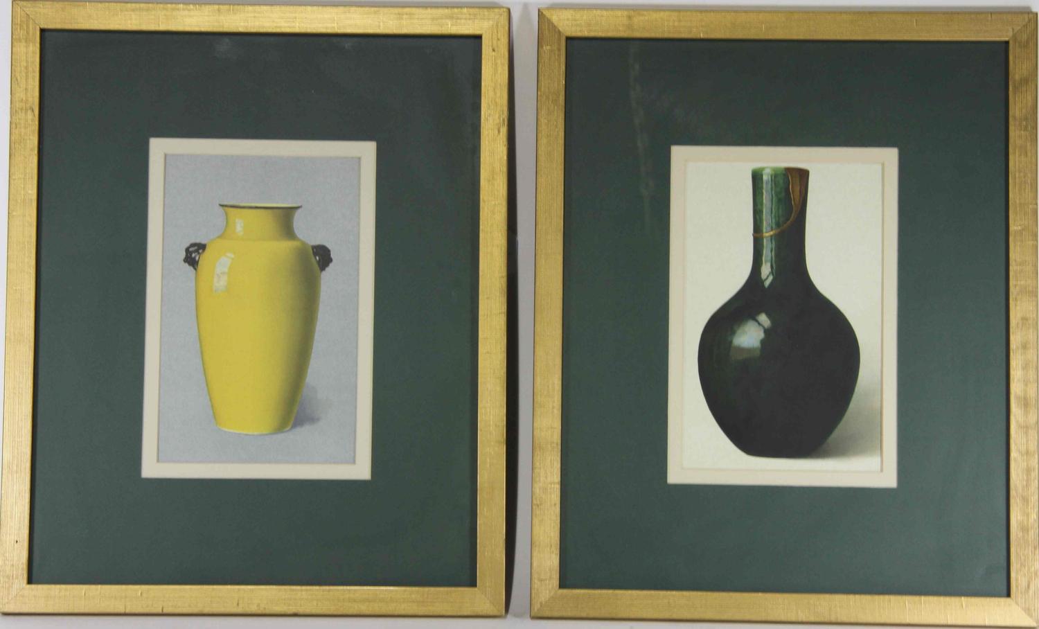A Group of Four Ceramic Plates Height of tallest 22 1/2 inches.