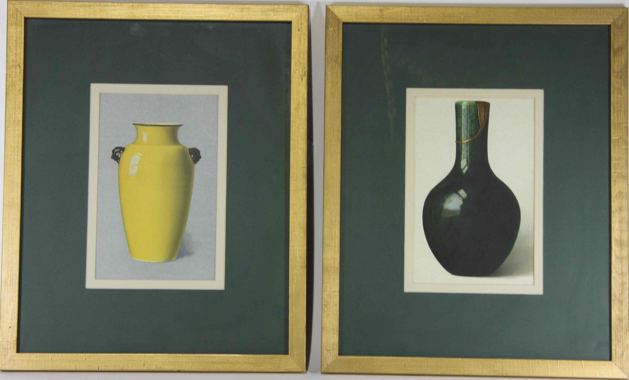 A Group of Four Ceramic Plates Height of tallest 22 1/2 inches.