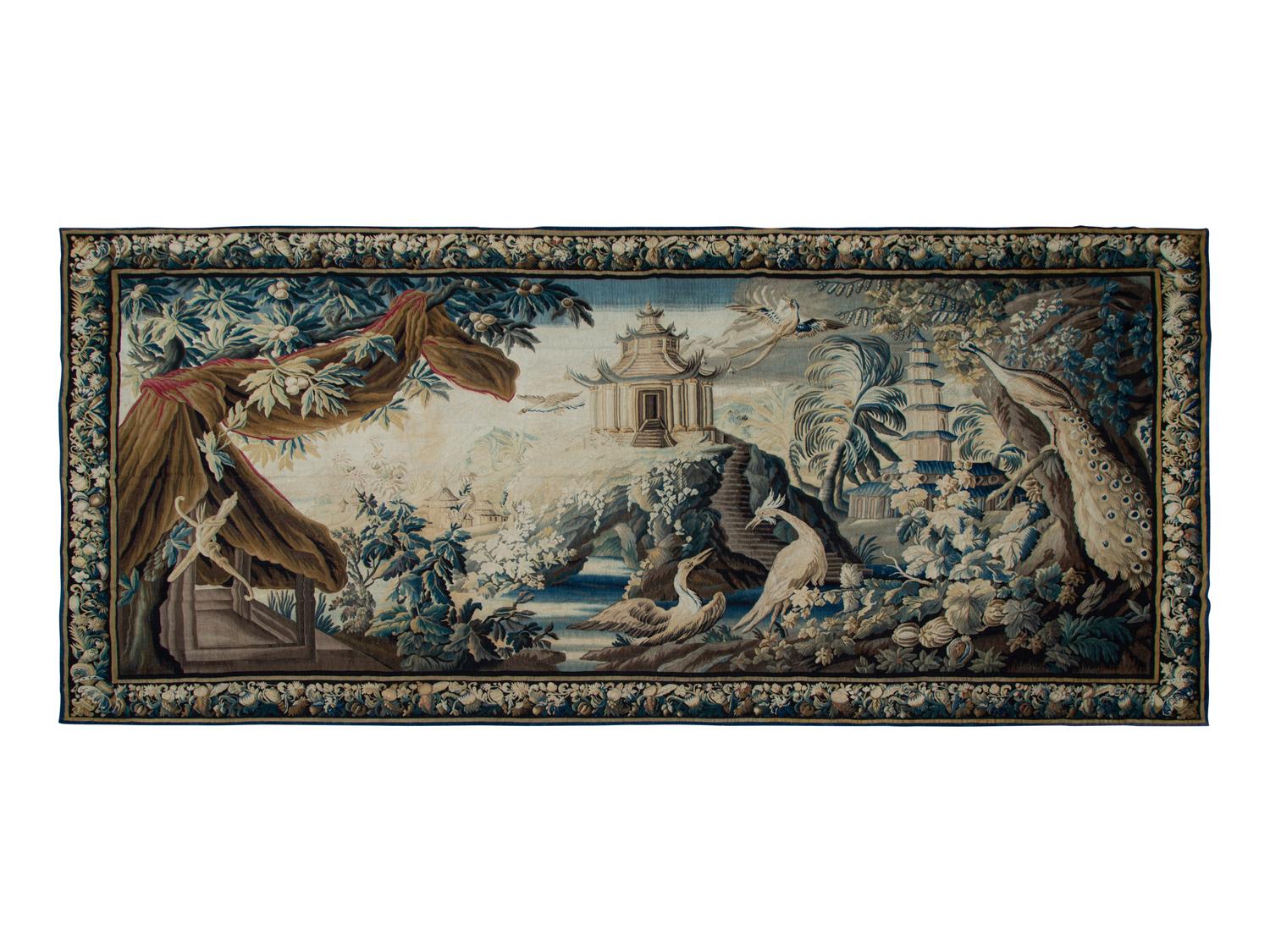 A Continental Wool Tapestry Depicting Exotic Birds in a Landscape with a Pagoda — 17TH/18TH CENTURY