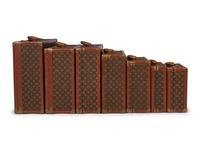 A Group of Seven Louis Vuitton Hardside Suitcases