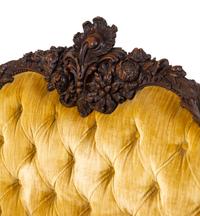 A Rococo Revival Carved Walnut Settee