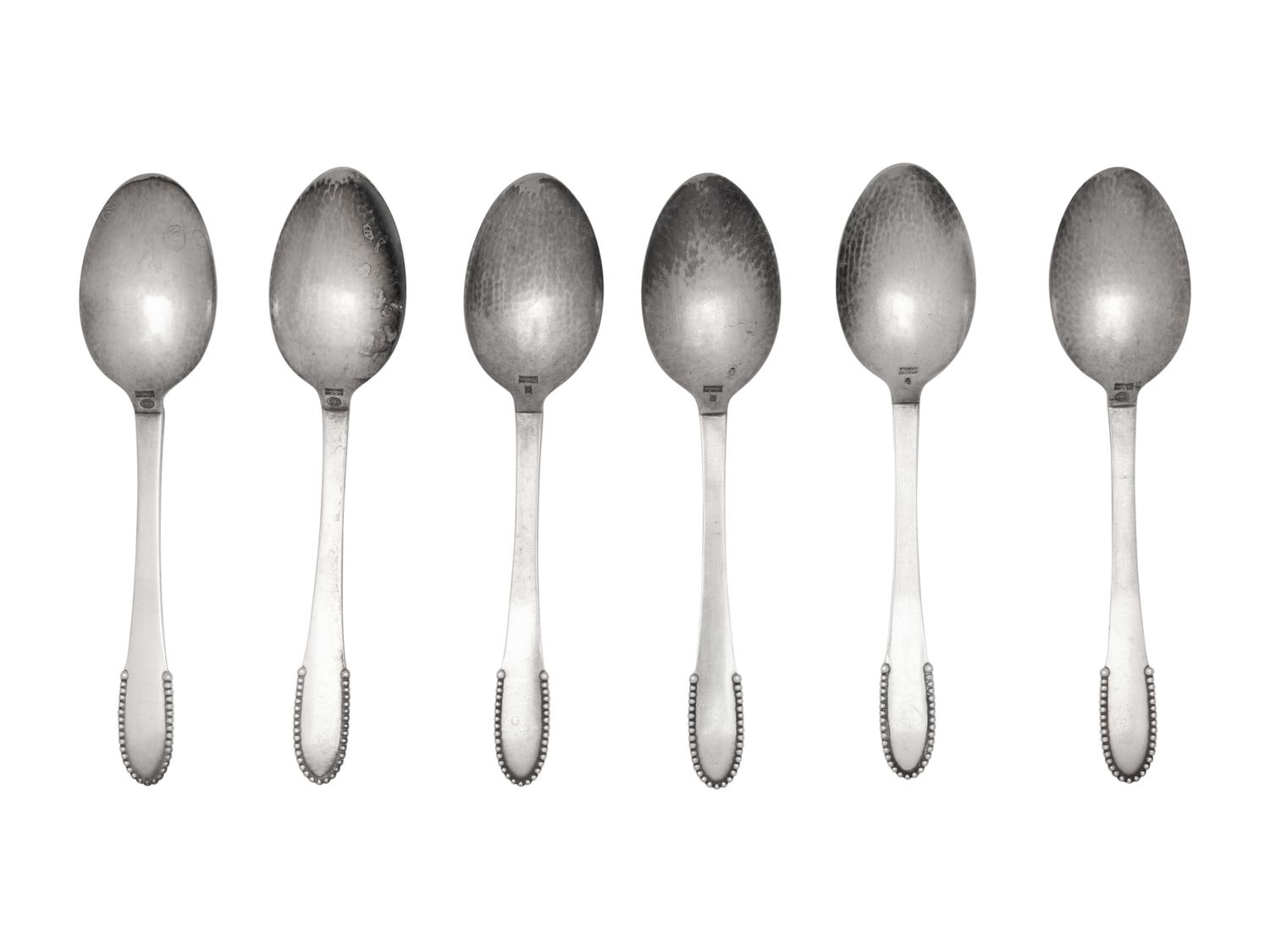 A Set of Six Georg Jensen Beaded Pattern Dessert Spoons