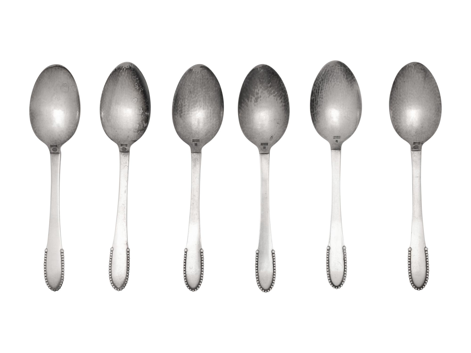 A Set of Six Georg Jensen Beaded Pattern Dessert Spoons