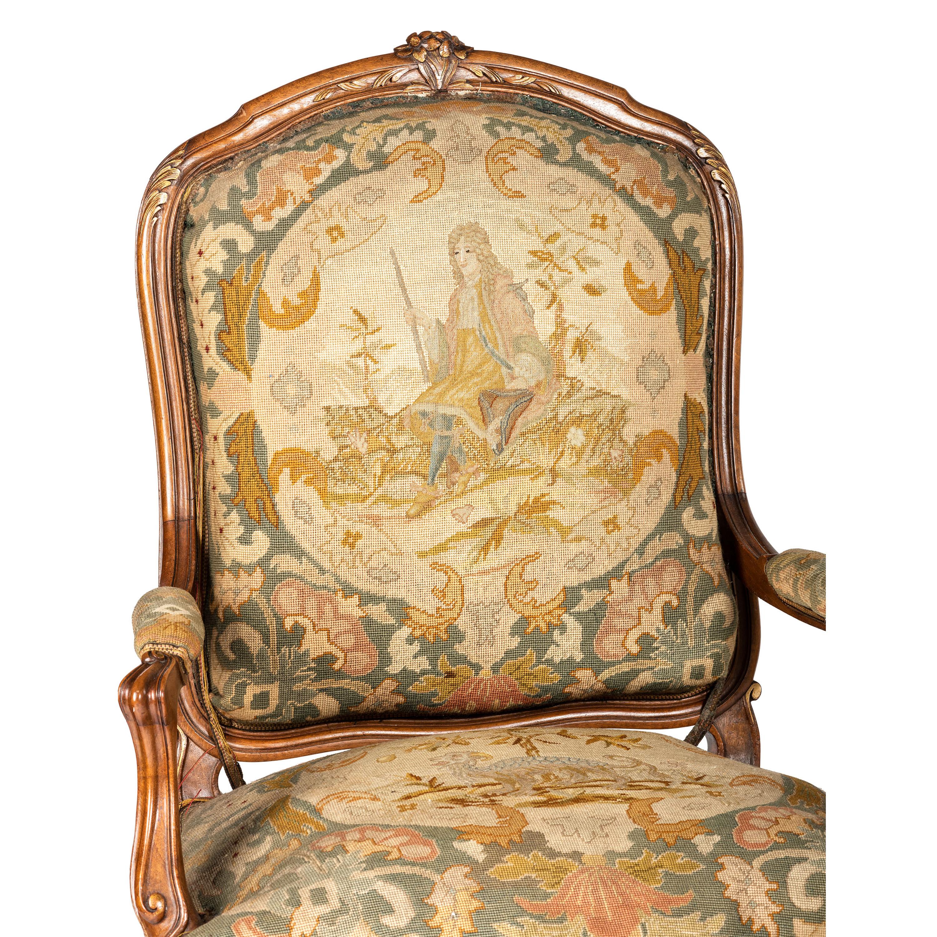 A Suite of Louis XV-Style Carved Walnut Needlework Upholstered Seating Furniture