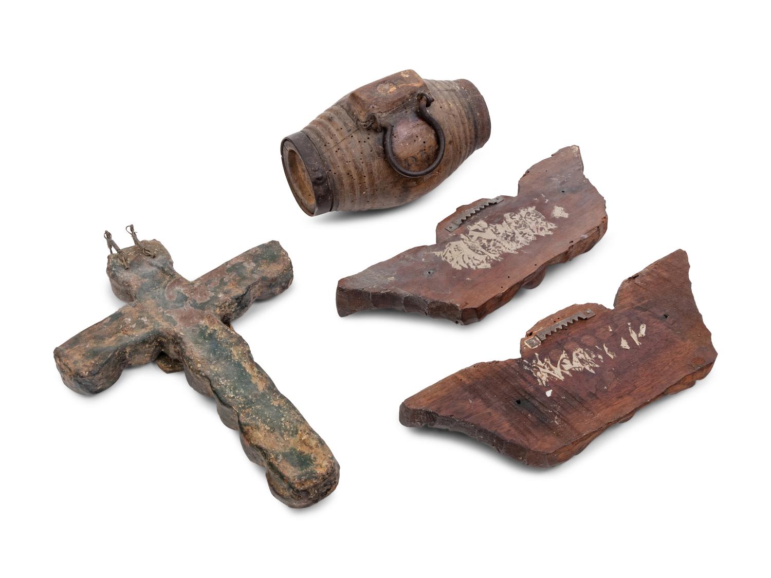 A Colonial Polychrome Decorated Lead Crucifix with a Brandy Cask and Two Carved Putto Masks