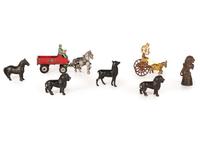 A Group of Cast Iron Banks and Pull Toys