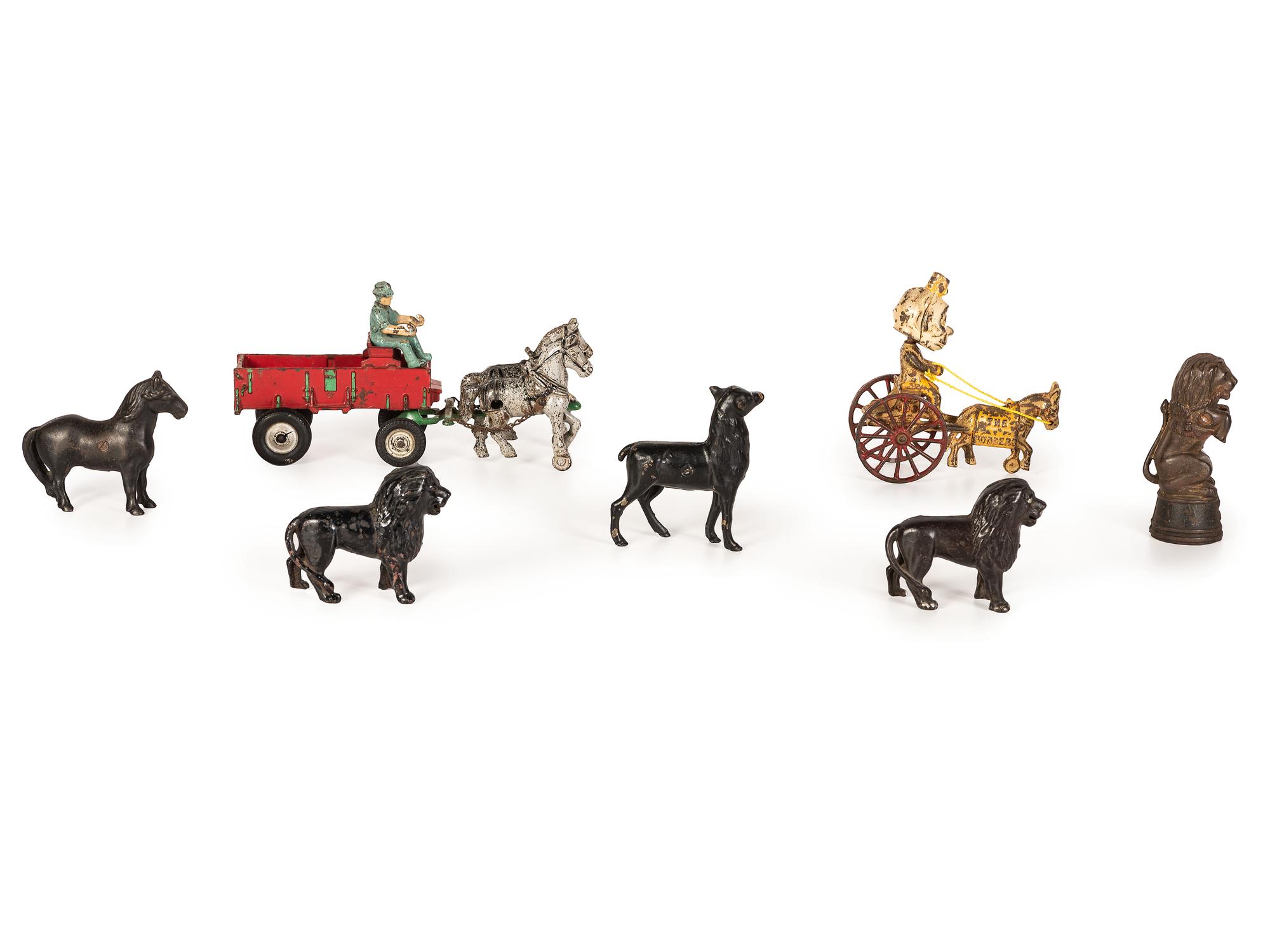 A Group of Cast Iron Banks and Pull Toys