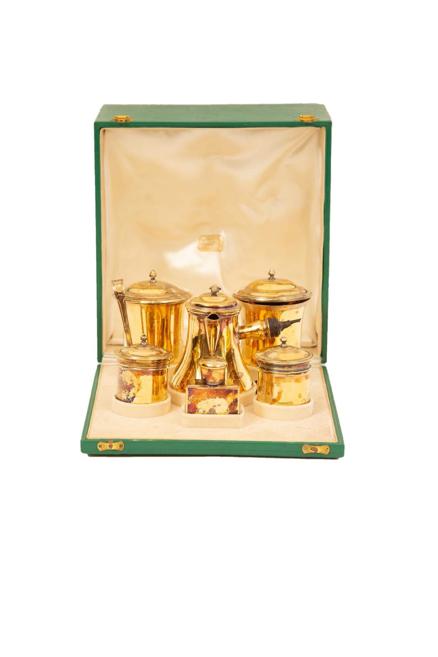 A French Silver-Gilt Six-Piece Chocolate Service