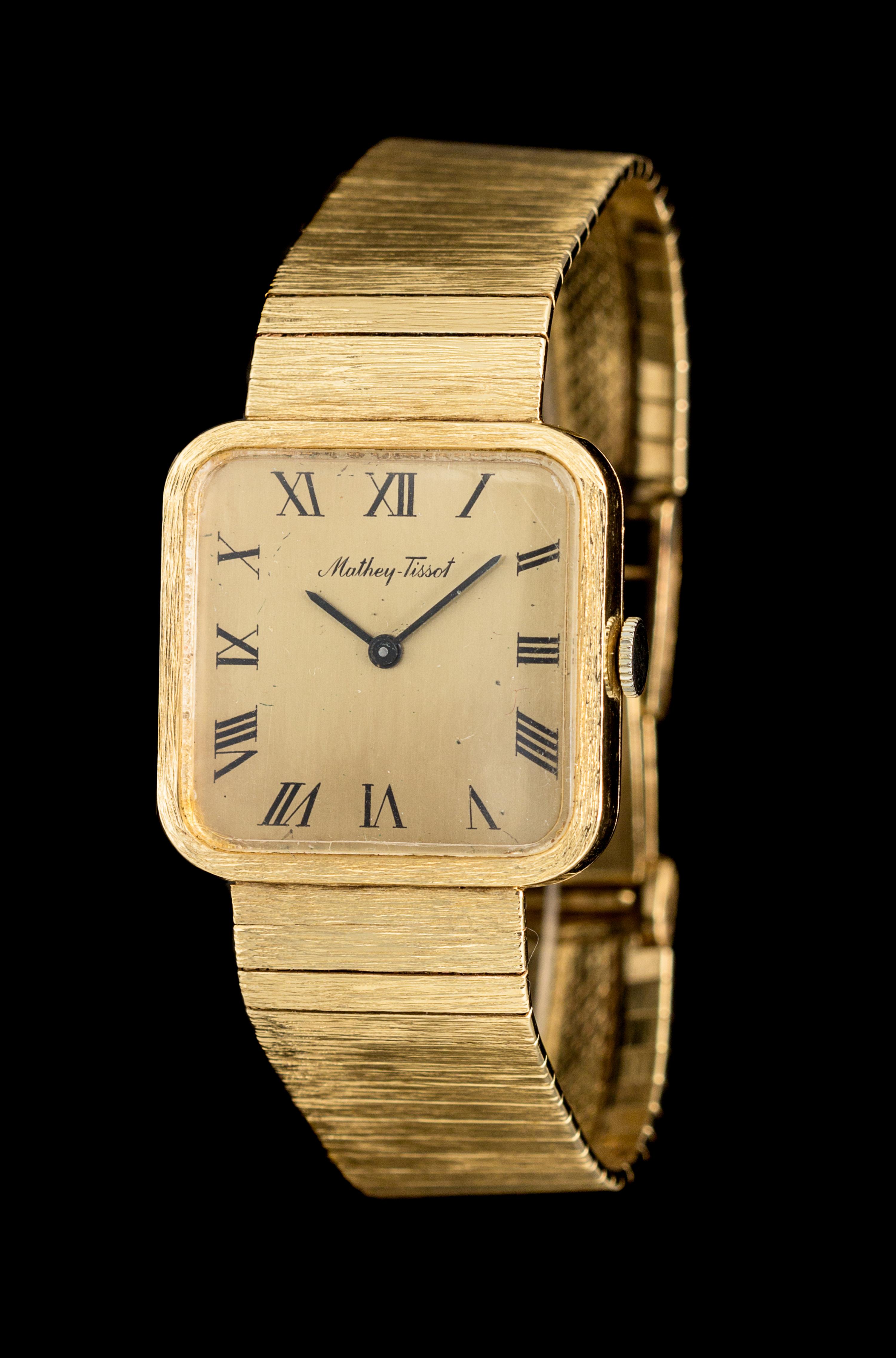 A 14 Karat Yellow Gold Wristwatch, Matthey-Tissot,
