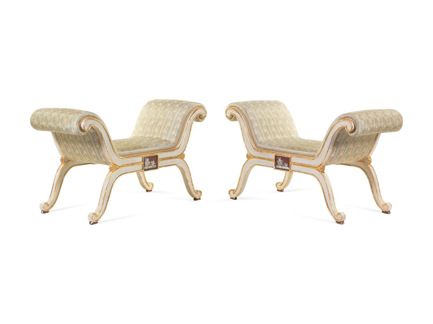 A Pair of Russian Parcel Gilt and White-Painted Window Seats