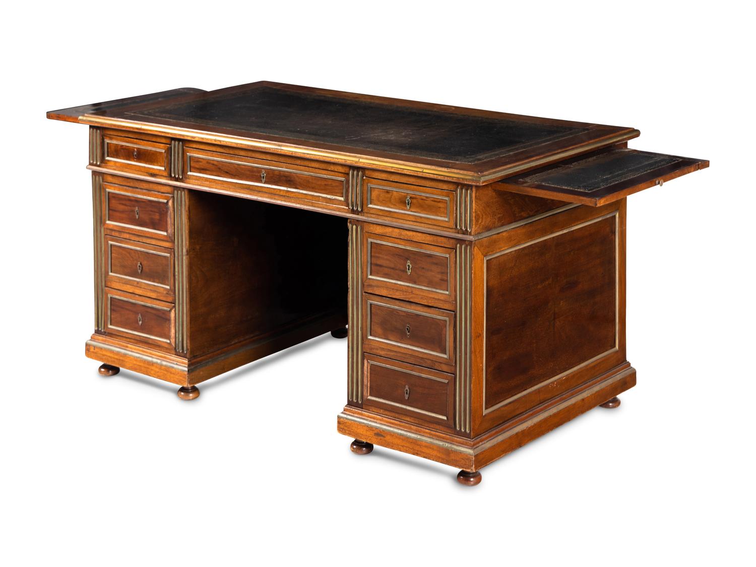 A Directoire Style Brass Mounted Mahogany Pedestal Desk