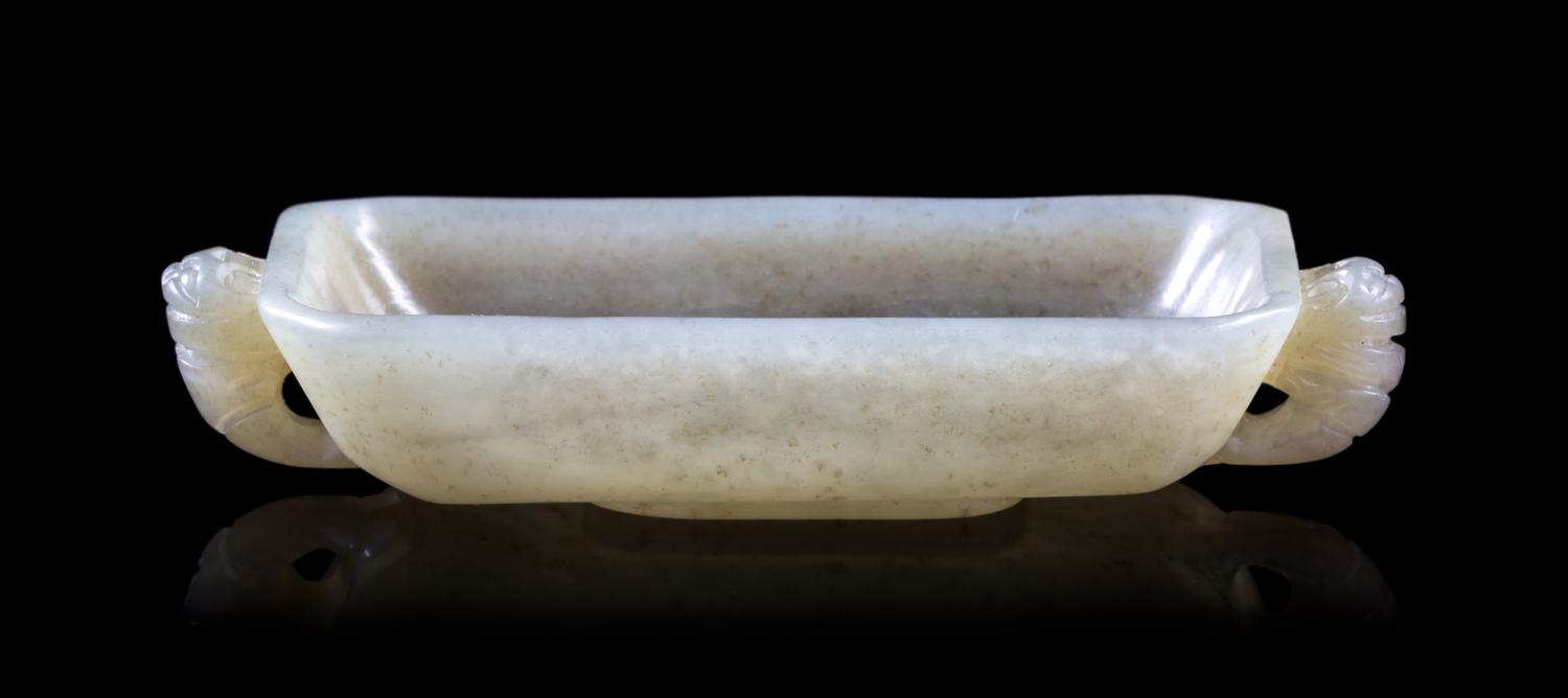 A Celadon Jade Twin Handled Dish Length 3 3/4 inches.