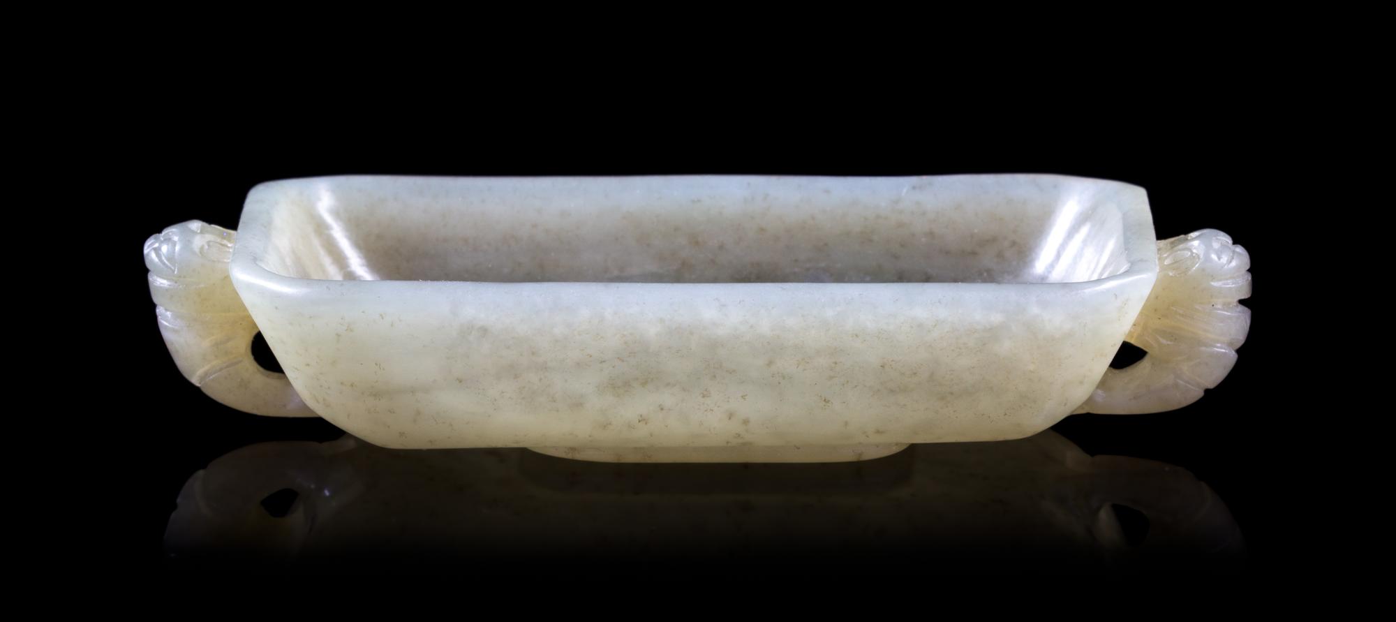 A Celadon Jade Twin Handled Dish Length 3 3/4 inches.