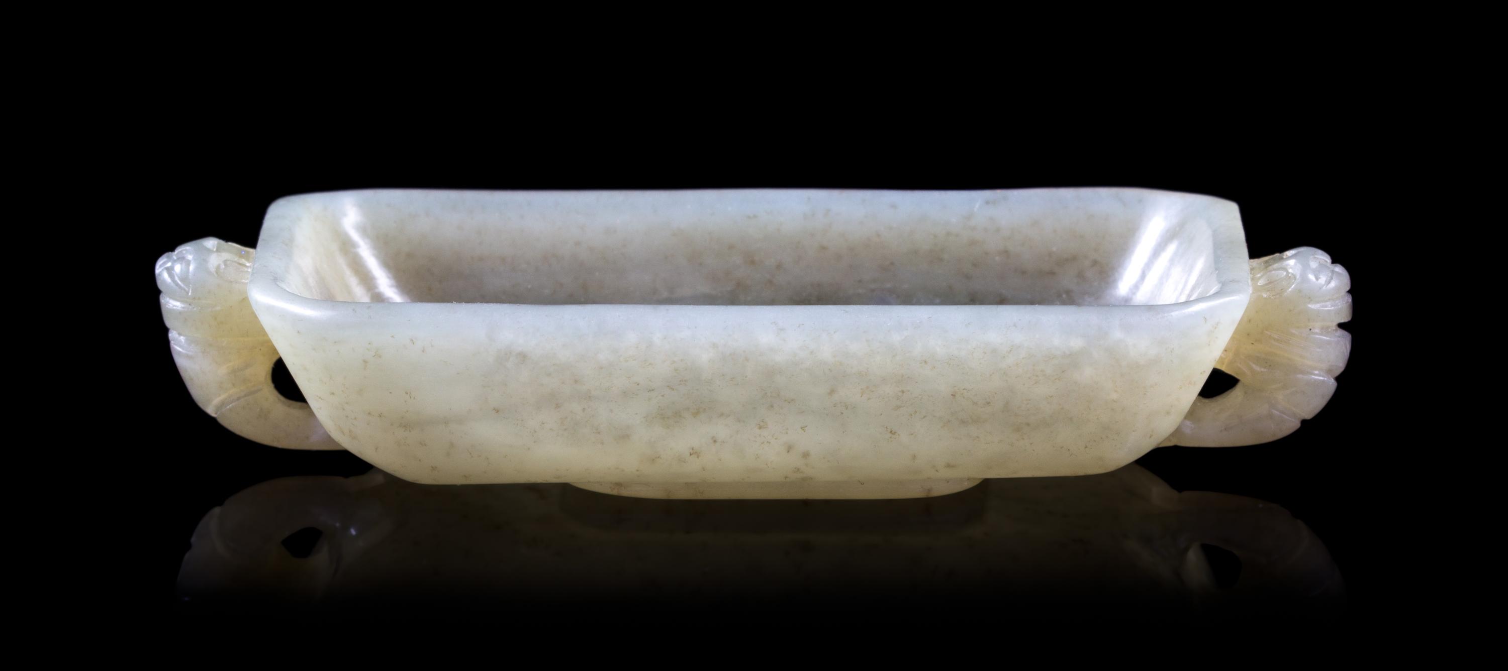 A Celadon Jade Twin Handled Dish Length 3 3/4 inches.