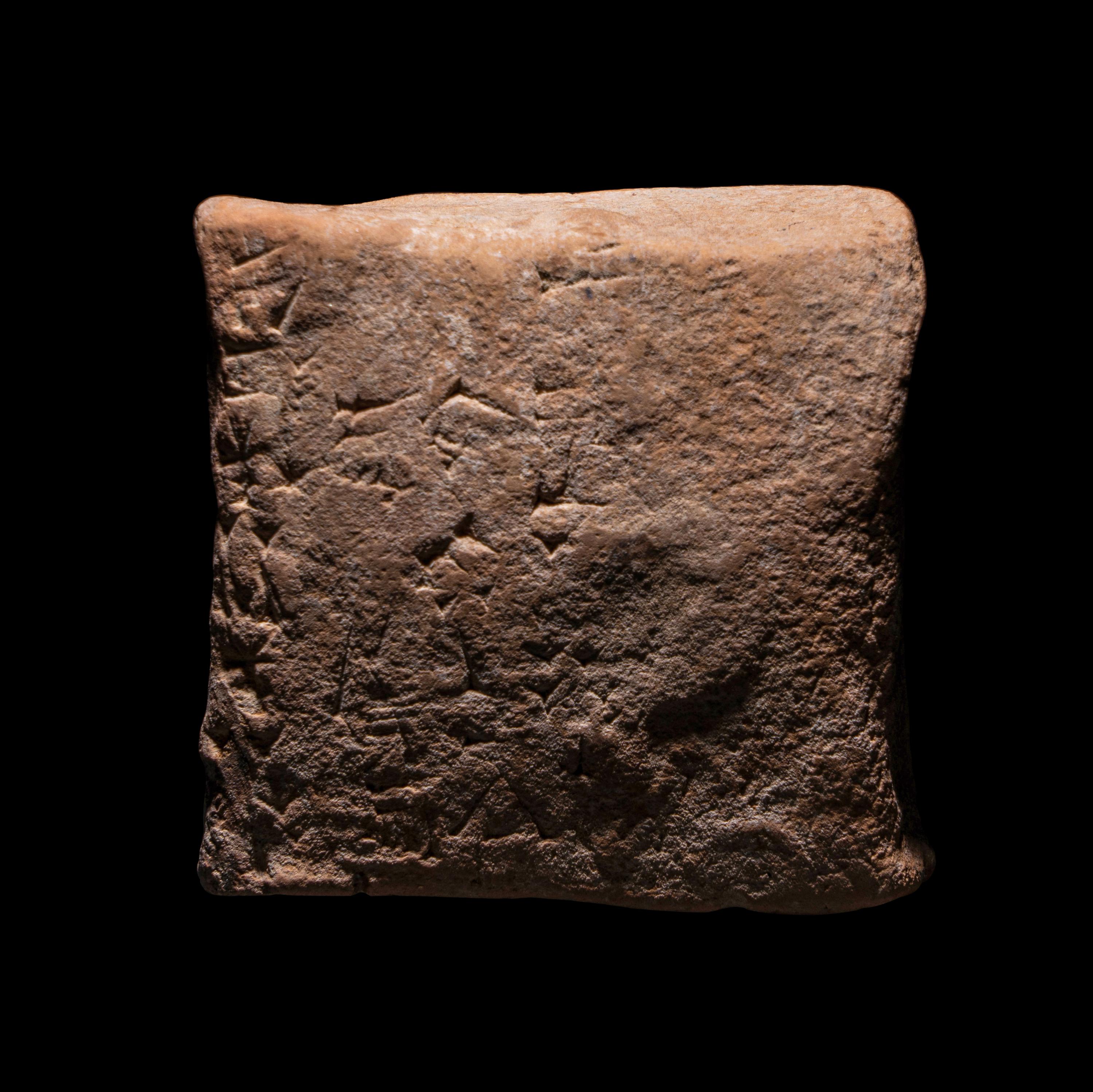 A Sumerian Clay Cuneiform Pillow Tablet