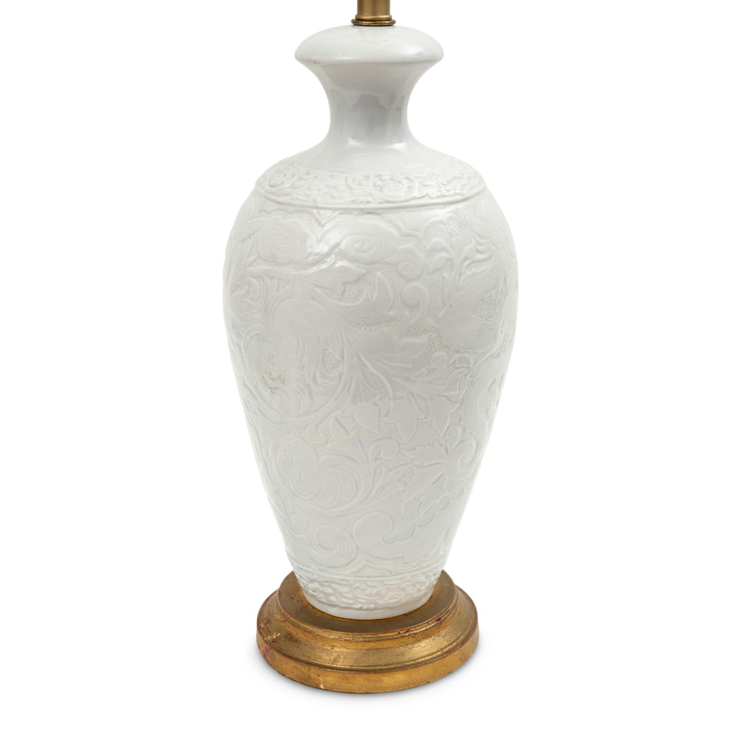 A Pair of White-Glazed Majolica Vases Mounted as Lamps