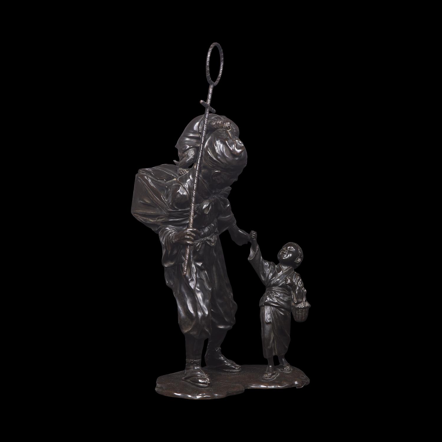 A Japanese Tokyo School Patinated Bronze Monkey Trainer Figural Group, Meiji/Taisho Period