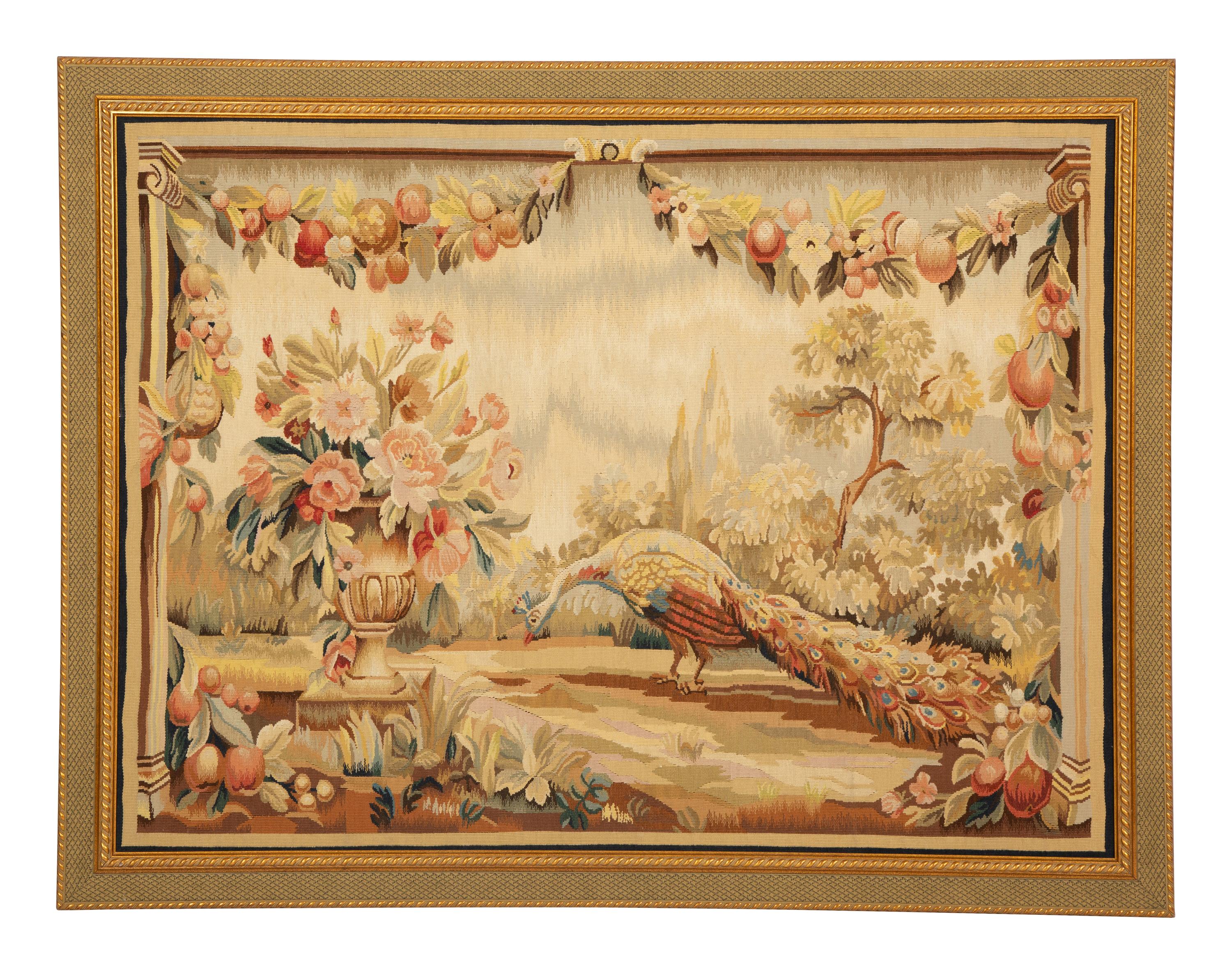 A Framed Needlework Panel Depicting a Peacock in Landscape