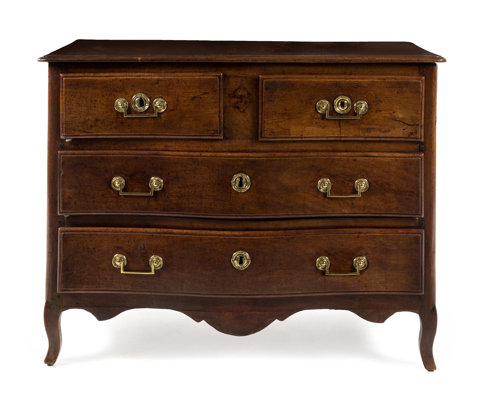 A Louis XV Provincial Walnut Commode Height 35 1/2 x width 47 1/2 x depth 22 inches. — 18TH CENTURY