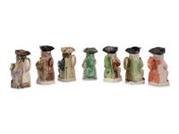 A Collection of Seven Ceramic Toby Mugs
