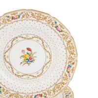A Set of Eight Royal Doulton Porcelain Dinner Plates
