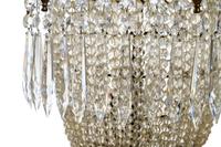 A French Gilt Metal and Cut Glass Six-Light Chandelier