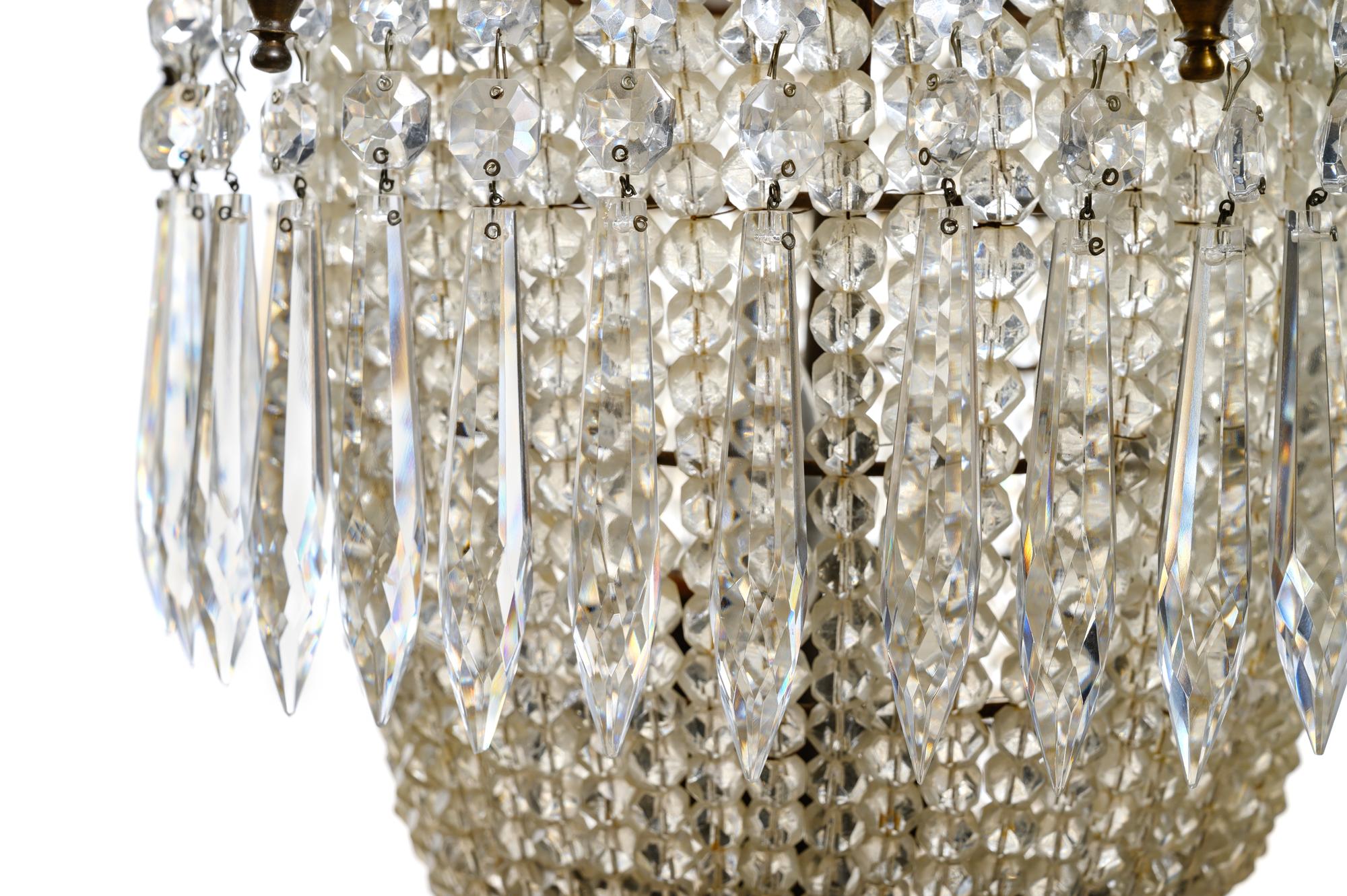 A French Gilt Metal and Cut Glass Six-Light Chandelier