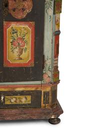 A Continental Carved, Painted and Parcel Gilt Pine Schrank