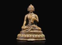 A small Himalayan (possibly Nepalese) figure of a seated attendant or donor 喜馬拉雅或尼泊爾坐像一尊