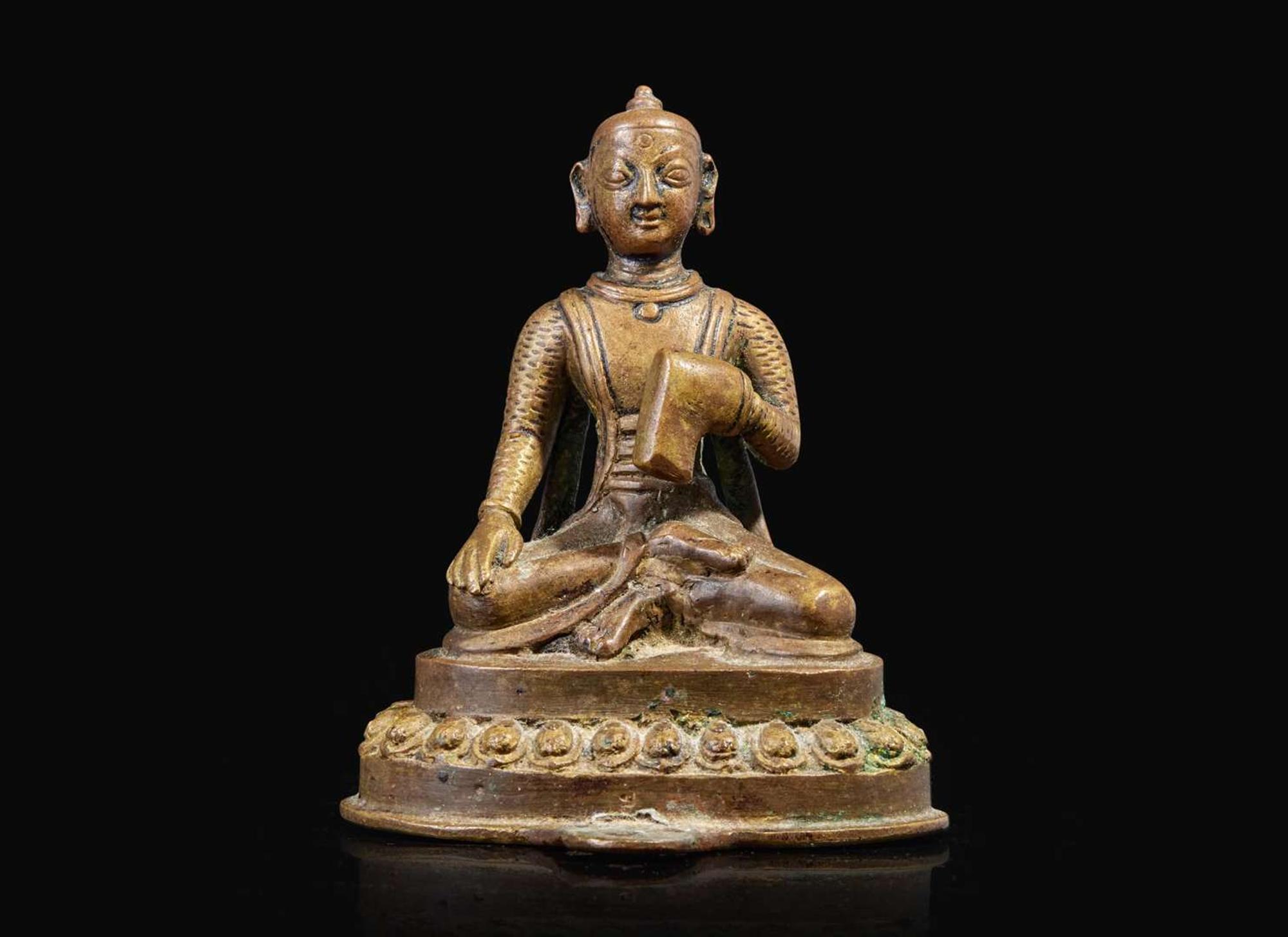 A small Himalayan (possibly Nepalese) figure of a seated attendant or donor 喜馬拉雅或尼泊爾坐像一尊