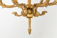 A Pair of Empire Gilt Bronze Six-Light Chandeliers