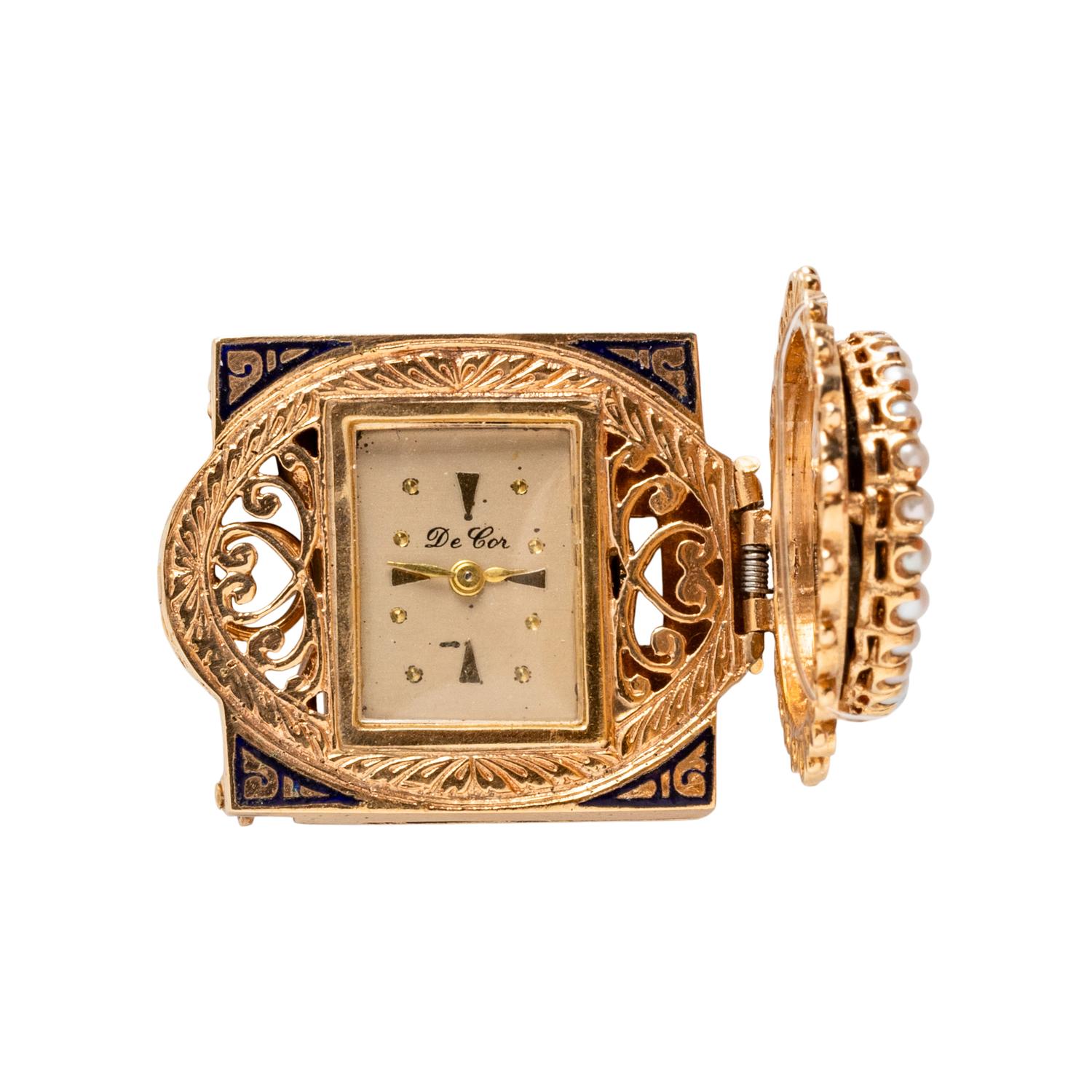 YELLOW GOLD, ENAMEL, AND SEED PEARL SURPRISE WATCH